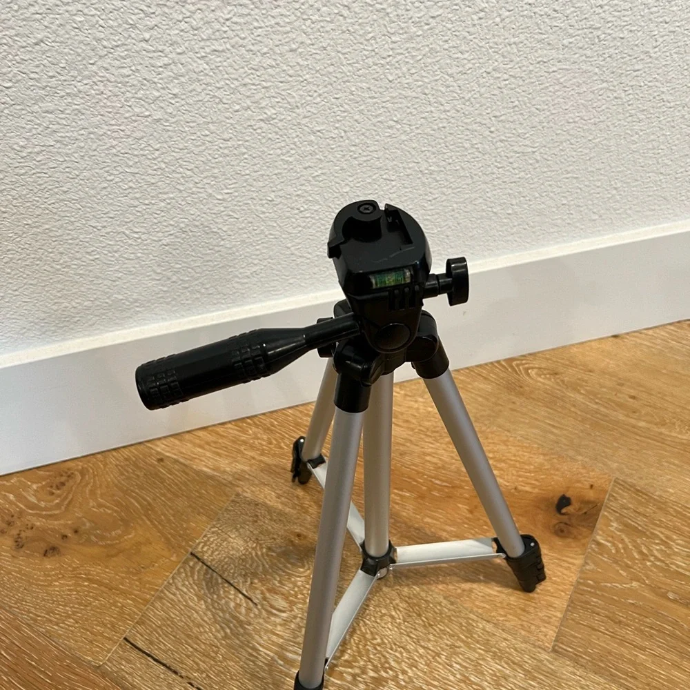 Compact Black and Silver Camera Tripod